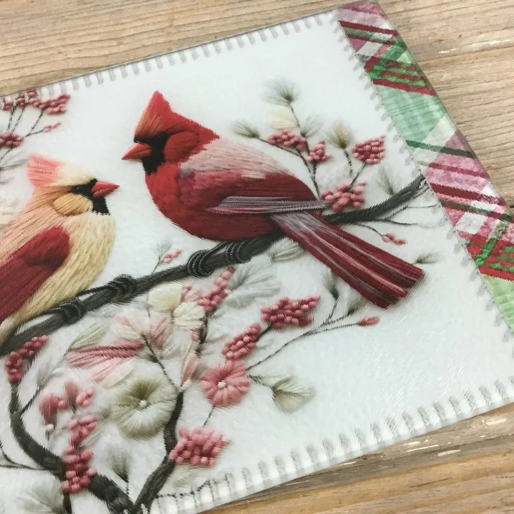 Cardinals on Festive Plaid Glass Cutting Board 11.25